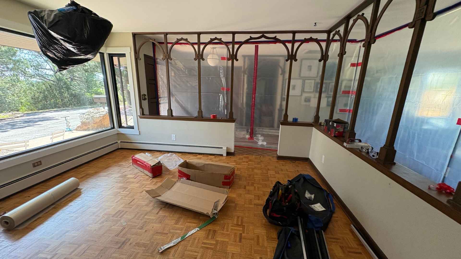 Professional restoration contractor documenting water damage for insurance claim