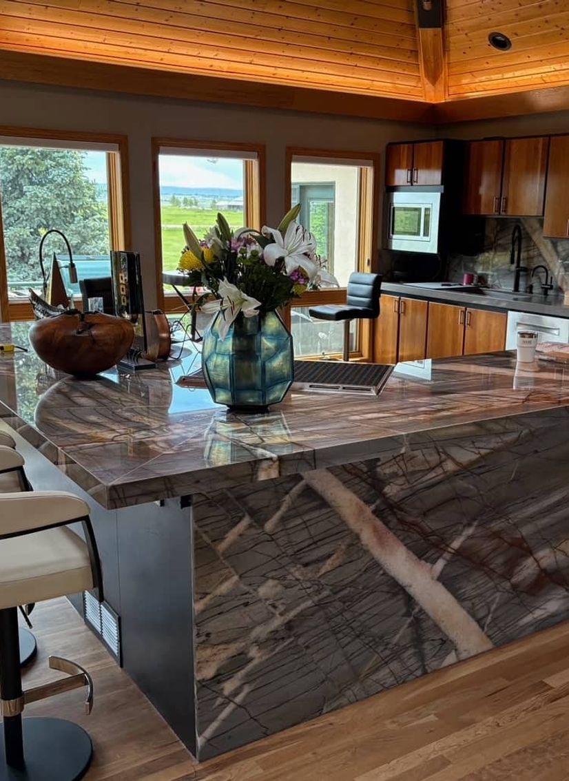 Modern kitchen with large stone island