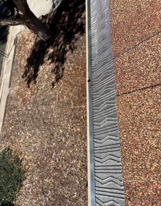 Gutter installation and maintenance, exterior house view